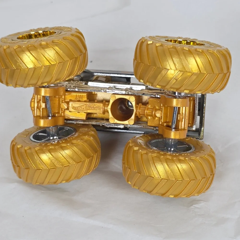 Hot Wheels Monster Trucks Bigfoot 4x4 50th Anniversary Gold 1:64 Scale Die-Cast
